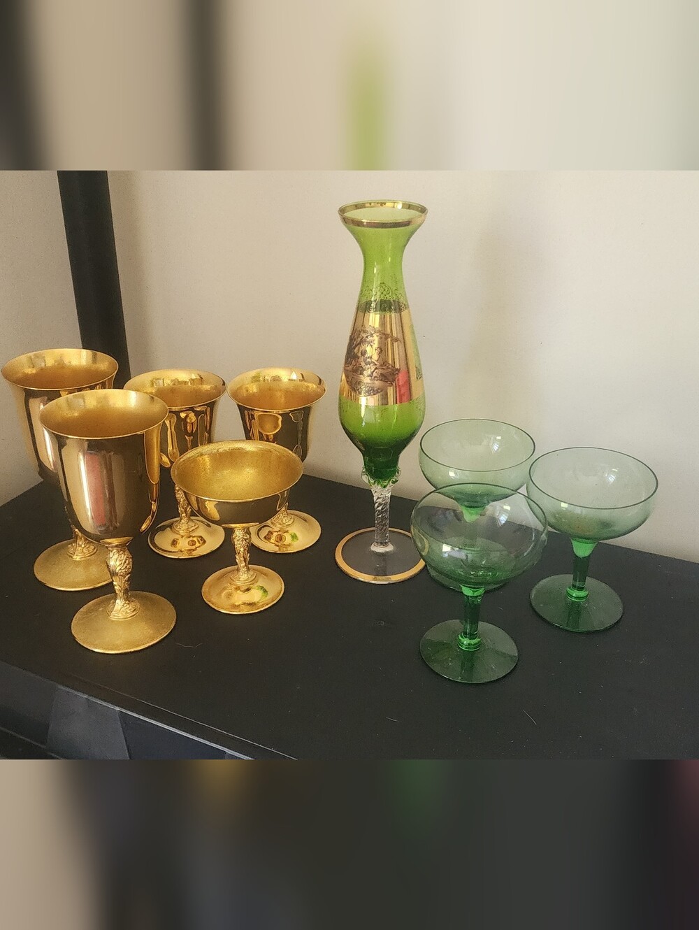 Green glass and Gold Plated Goblets.